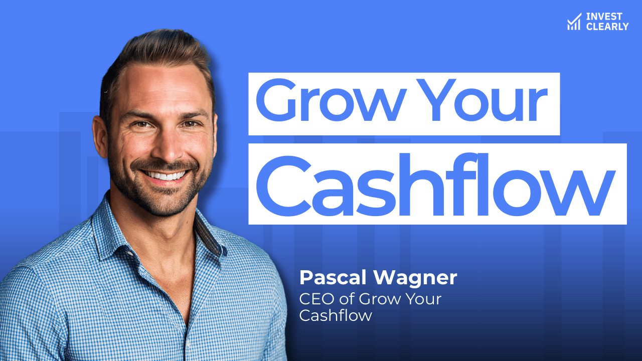 A promotional graphic for Invest Clearly featuring Pascal Wagner, CEO of Grow Your Cashflow. The text reads “Grow Your Cashflow.” Pascal is smiling and wearing a blue checkered button-down shirt against a blue gradient background with subtle geometric shapes and the Invest Clearly logo in the top left corner.